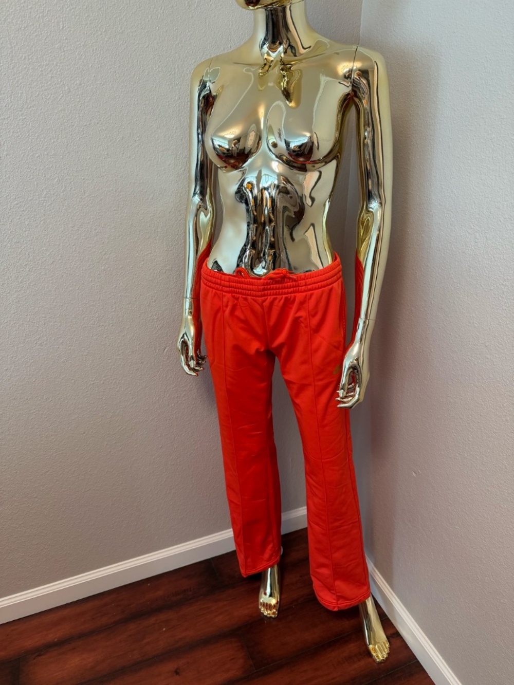 Nike coral track pants, size medium